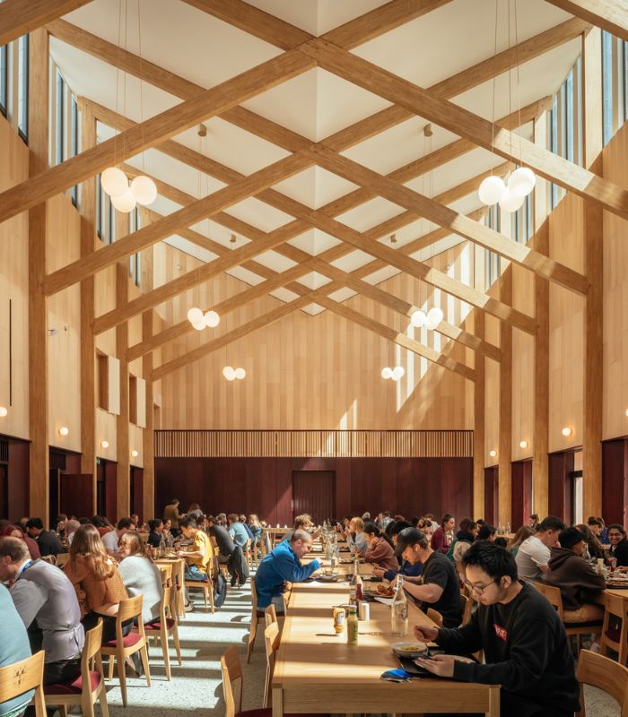 Arts and Crafts inspired dining hall with wooden slats arching across the roomjpg